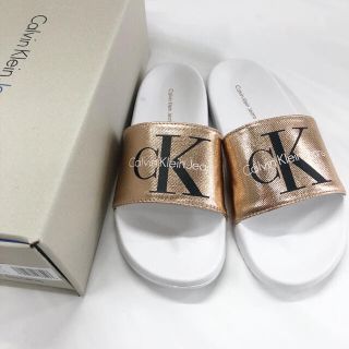 カルバンクライン(Calvin Klein)のカルバンクライン　サンダル　レディース　ck ピンクゴールド　新品未使用　汚れ有(サンダル)