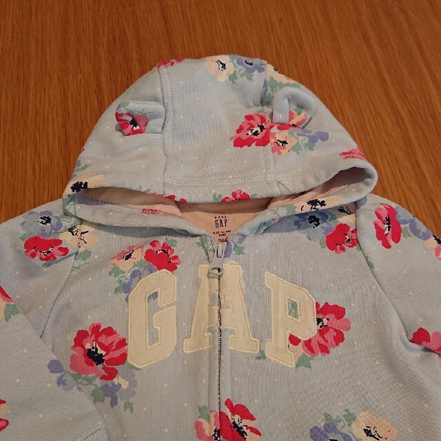 babyGAP(ベビーギャップ)のbabyGAP 70cm水色花柄パーカー❁裾フリル＆耳付き♡ キッズ/ベビー/マタニティのベビー服(~85cm)(ジャケット/コート)の商品写真