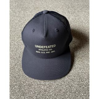 アンディフィーテッド(UNDEFEATED)のUNDEFEATED ATHLETIC TRUCKER cap 新品(キャップ)