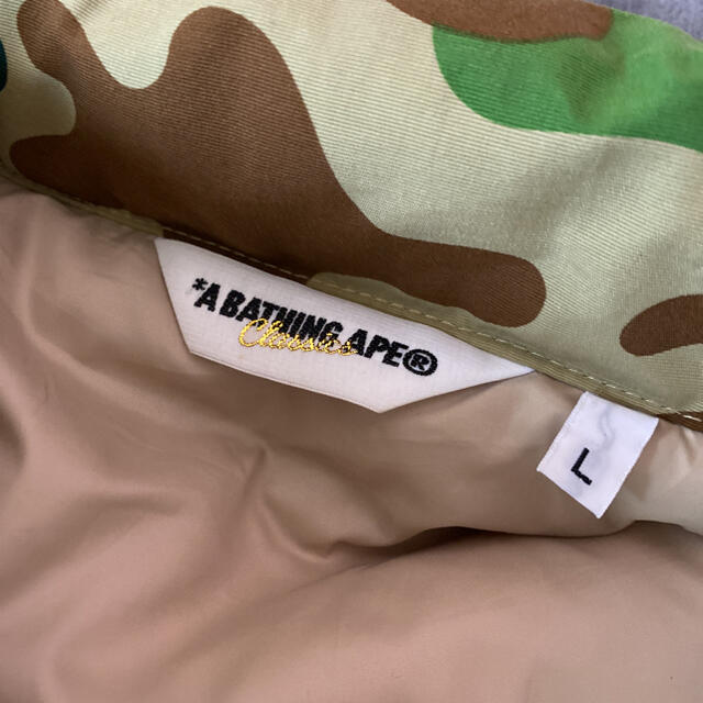 A BATHING APE(アベイシングエイプ)のエイプ ダウンベスト パズルカモ柄 美品 Lサイズ メンズのジャケット/アウター(ダウンベスト)の商品写真