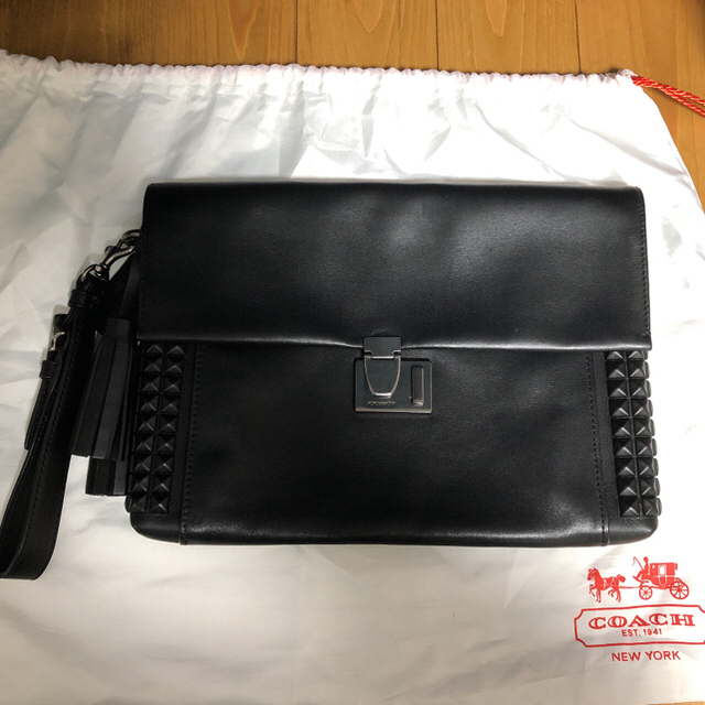 COACH(コーチ)クラッチバッグ レガシーオニキススタッズロック-