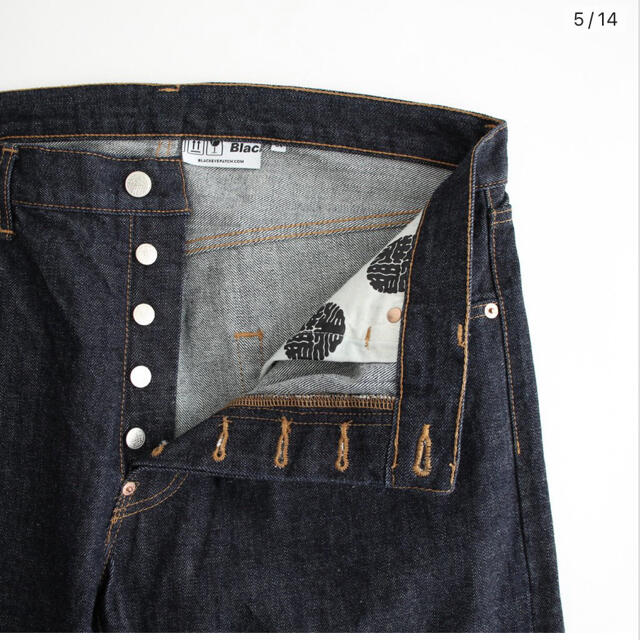 black eye patch kamon jeans