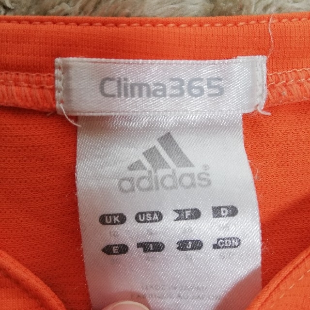 adidas(アディダス)の二枚set 　adidas/Clima365(オレンジ)　ユニクロ(パープル) スポーツ/アウトドアのランニング(ウェア)の商品写真