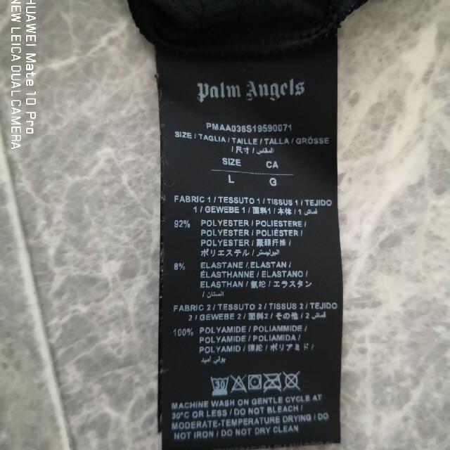 UNDER ARMOUR(アンダーアーマー)のpalm  Angelsとアンダーアーマーのコラボ メンズのトップス(Tシャツ/カットソー(半袖/袖なし))の商品写真