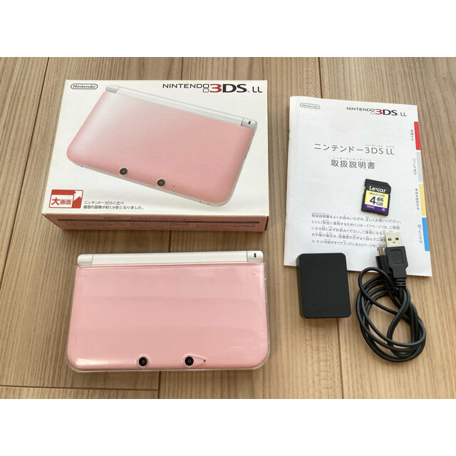 ニンテンドー3DS(ニンテンドー3DS)のNintendo 3DS  LL 本体ピンク/ホワイト エンタメ/ホビーのゲームソフト/ゲーム機本体(携帯用ゲーム機本体)の商品写真