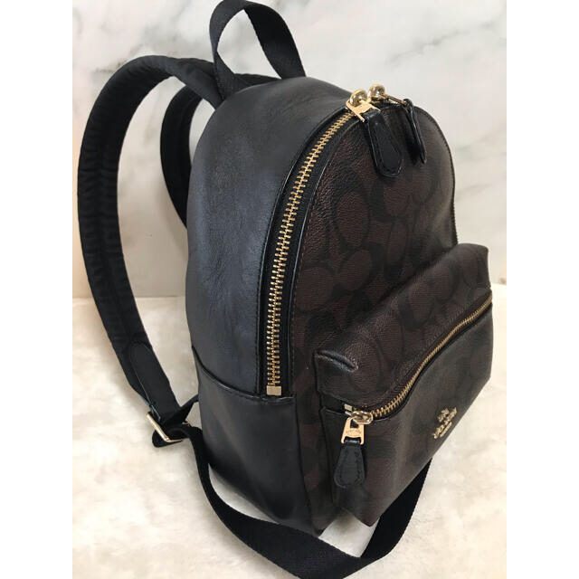 美品‼️COACH（ダークブラウンF58315ミニリュックチャーリーシグネチャー