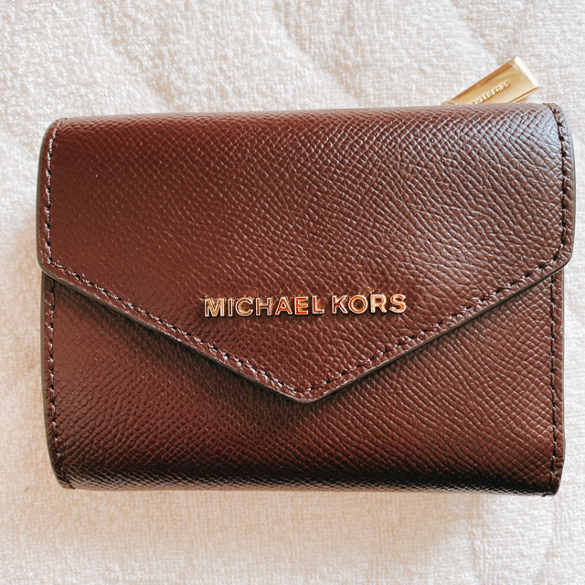 Michael Kors(マイケルコース)の二つ折り財布　茶色　マイケルコース　値下げ！！ レディースのファッション小物(財布)の商品写真