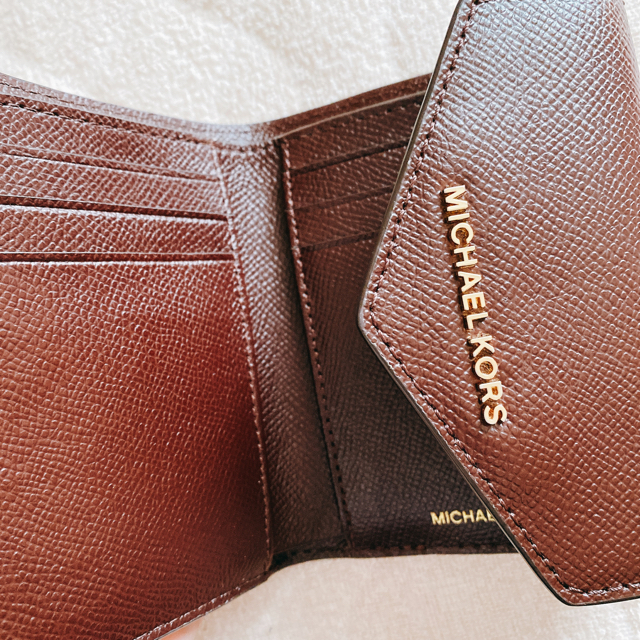 Michael Kors(マイケルコース)の二つ折り財布　茶色　マイケルコース　値下げ！！ レディースのファッション小物(財布)の商品写真