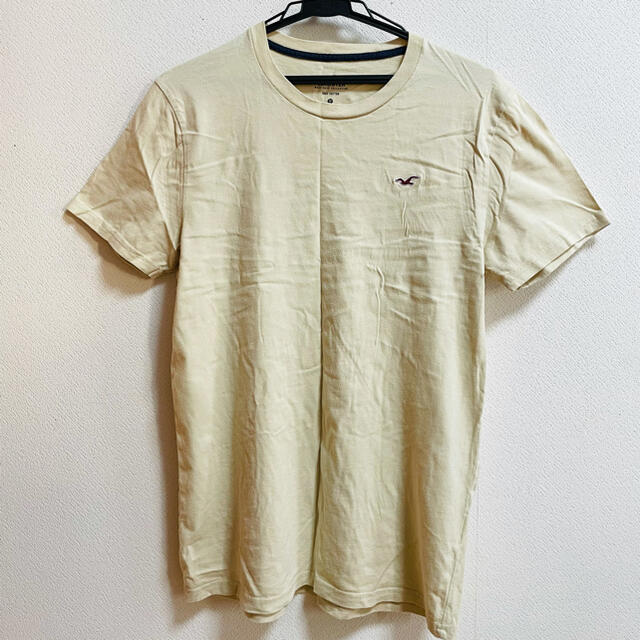 Hollister(ホリスター)の【匿名配送】ホリスター　マストハブ　ベージュ　Tシャツ　M メンズのトップス(Tシャツ/カットソー(半袖/袖なし))の商品写真