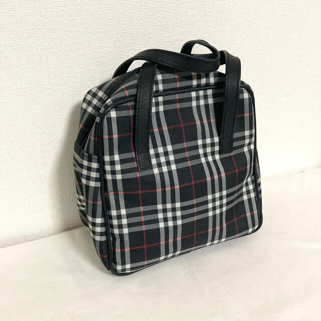サイズ BURBERRY ミニバッグ 未使用の通販 by Tショップ|バーバリー 国連安保理が ほぼ未使用⭐ バーバリー ハンドバッグ ミニ ドラム 筒 ノバチェック ハンドバッグ