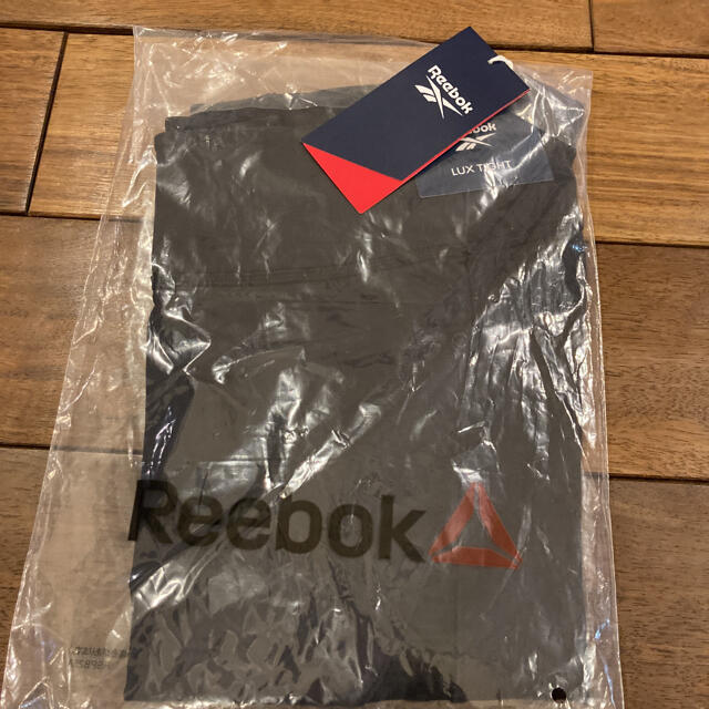 Reebok(リーボック)の新品未使用 Reebok ラックス カラーブロック タイツ.レギンス Mサイズ レディースのレッグウェア(レギンス/スパッツ)の商品写真