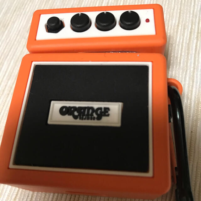 ORANGEのアンプ型AirPodsケース　値下げ不可 スマホ/家電/カメラのスマホアクセサリー(その他)の商品写真