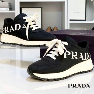 Prada 2271 プラダ サイドロゴ ナイロン素材 スニーカー 黒の通販 ラクマ Prada 2271 プラダ サイドロゴ ナイロン素材 スニーカー 黒の通販 ラクマ
