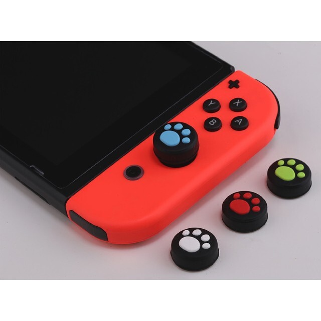 Switch スイッチ ジョイコン スティックカバー 白 ピンク 2個 肉球 エンタメ/ホビーのゲームソフト/ゲーム機本体(その他)の商品写真