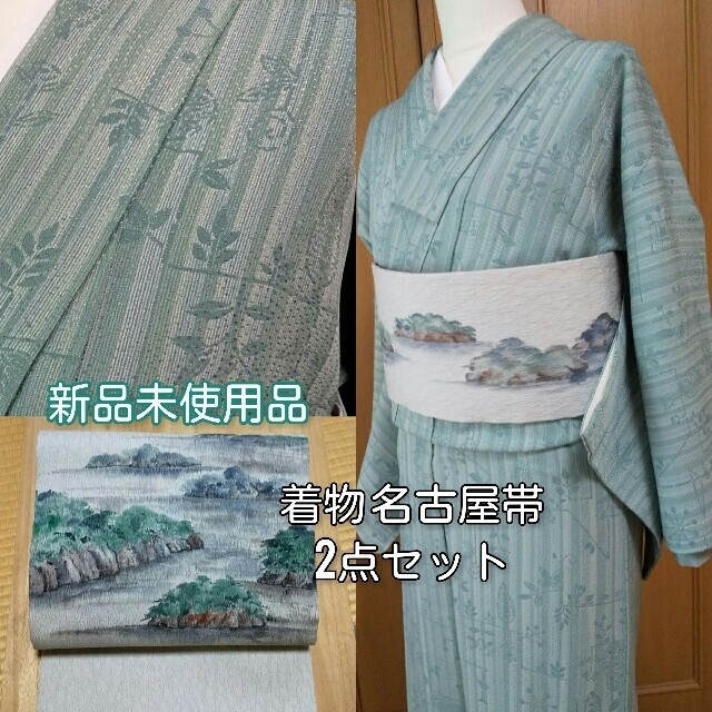 K-3030 紬着物 作家物 生つむぎ 魚 烏賊 蟹 薄小豆色 トールサイズ