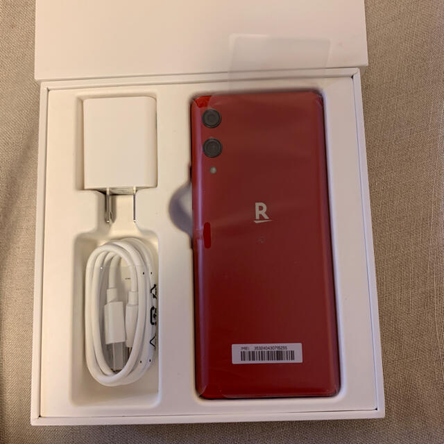 Rakuten(ラクテン)の新品未開封 楽天Hand 本体 赤色 楽天モバイル RED ケース付 スマホ/家電/カメラのスマートフォン/携帯電話(スマートフォン本体)の商品写真