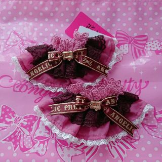 アンジェリックプリティー(Angelic Pretty)の新品  Angelic pretty Chocolaterieお袖留め ピンク(ブレスレット/バングル)