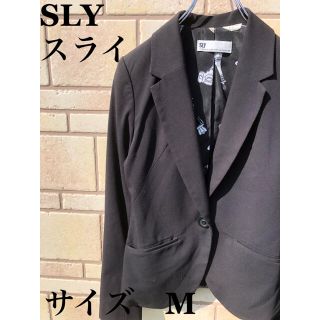 スライ(SLY)のSLY スライ  テーラードジャケット　インナー総柄　サーカス　ピエロ　黒(テーラードジャケット)