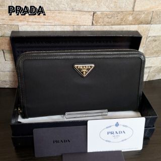 プラダ(PRADA)のプラダ ラウンドファスナー テスート レザー 長財布 極美品　【鑑定済】(ストール)