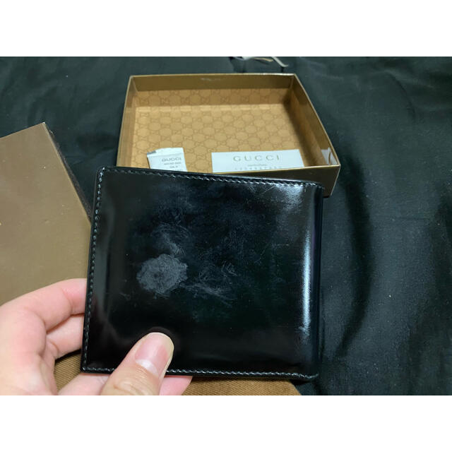 Gucci(グッチ)のオールドGUCCI 折りたたみ黒革の財布 メンズのファッション小物(折り財布)の商品写真