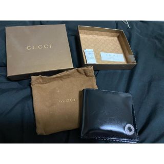 グッチ(Gucci)のオールドGUCCI 折りたたみ黒革の財布(折り財布)