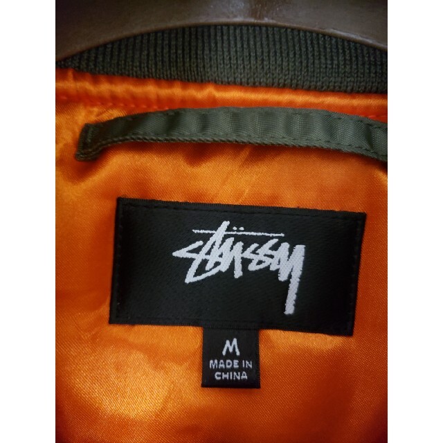 STUSSY(ステューシー)のStussy x CDG MA-1 ジャケット 40周年コラボ M メンズのジャケット/アウター(フライトジャケット)の商品写真