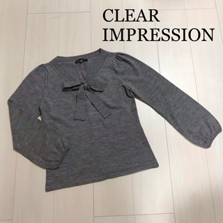 クリアインプレッション(CLEAR IMPRESSION)のCLEAR IMPRESSION  グレー　ニット　リボン付き(ニット/セーター)