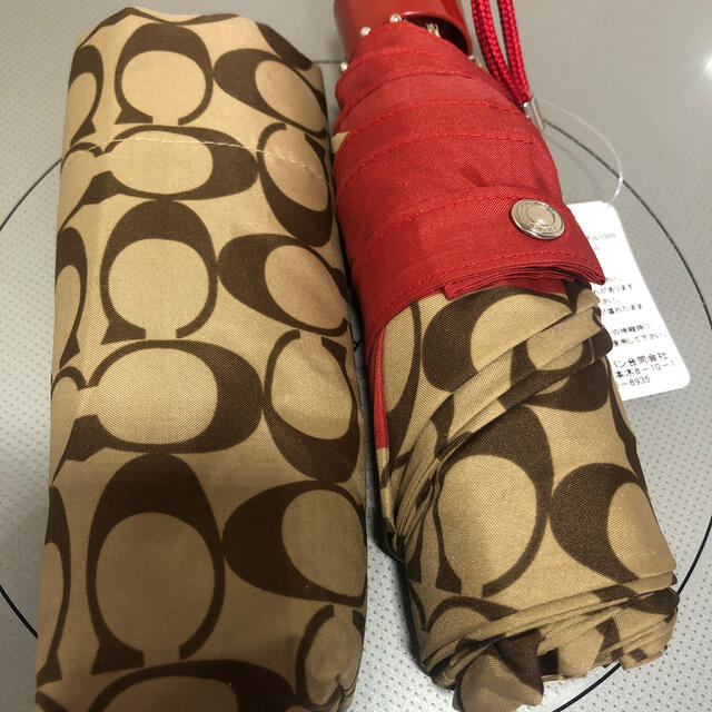 COACH(コーチ)のコーチ　折り畳み傘　新品未使用 レディースのファッション小物(傘)の商品写真