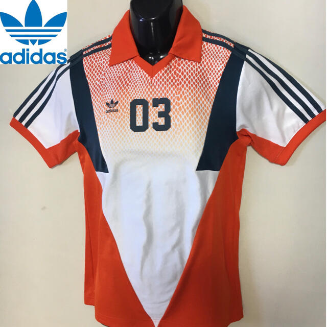 adidas(アディダス)のアディダスオリジナルス ゲームシャツ オレンジ  Sサイズ メンズのトップス(Tシャツ/カットソー(半袖/袖なし))の商品写真