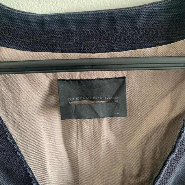 DIESEL(ディーゼル)のディーゼルブラックゴールドのベスト メンズのジャケット/アウター(ダウンベスト)の商品写真