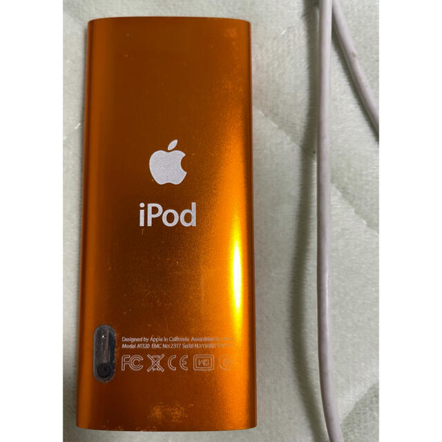 Apple(アップル)のiPod nano 第5世代 8GB オレンジ　ジャンク品 スマホ/家電/カメラのオーディオ機器(ポータブルプレーヤー)の商品写真