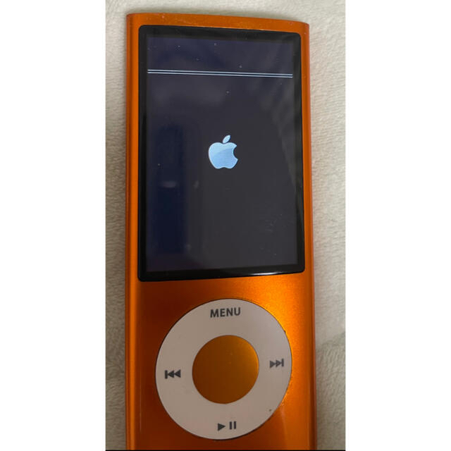 Apple(アップル)のiPod nano 第5世代 8GB オレンジ　ジャンク品 スマホ/家電/カメラのオーディオ機器(ポータブルプレーヤー)の商品写真