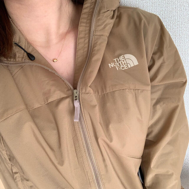 THE NORTH FACE(ザノースフェイス)の新品！ザ・ノースフェイスイスワローテイルフーディ　ナイロンジャケットMレディース レディースのジャケット/アウター(ナイロンジャケット)の商品写真