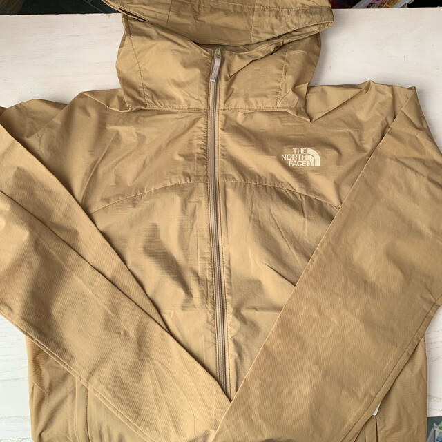 THE NORTH FACE(ザノースフェイス)の新品！ザ・ノースフェイスイスワローテイルフーディ　ナイロンジャケットMレディース レディースのジャケット/アウター(ナイロンジャケット)の商品写真