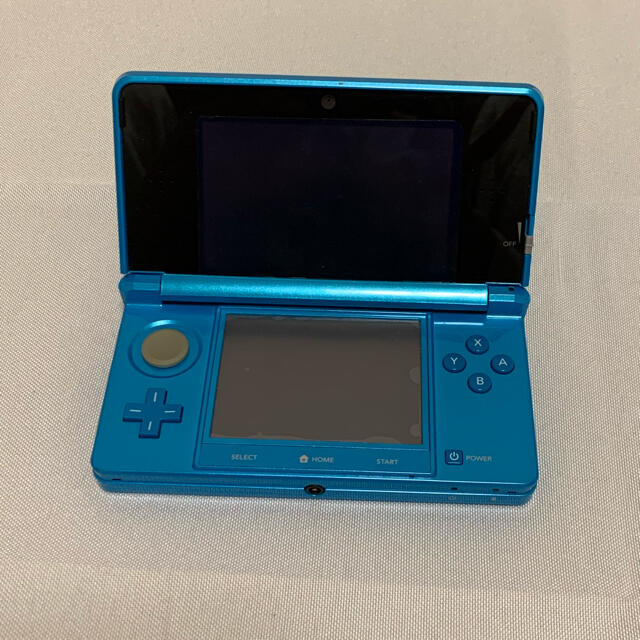 任天堂(ニンテンドウ)のNintendo 3DS  本体ライトブルー ＋ カセット（バラ売り可） エンタメ/ホビーのゲームソフト/ゲーム機本体(携帯用ゲーム機本体)の商品写真