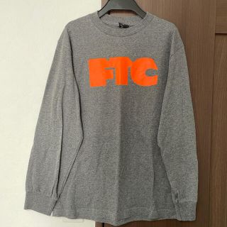 エフティーシー(FTC)のFTC 長袖 Tシャツ　グレー　オレンジ　ロゴ(Tシャツ/カットソー(七分/長袖))