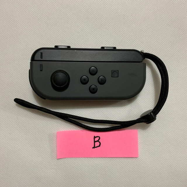 Nintendo Switch(ニンテンドースイッチ)のB完動品【ニンテンドー スイッチ】ジョイコン グレー(L)+ストラップ エンタメ/ホビーのゲームソフト/ゲーム機本体(その他)の商品写真