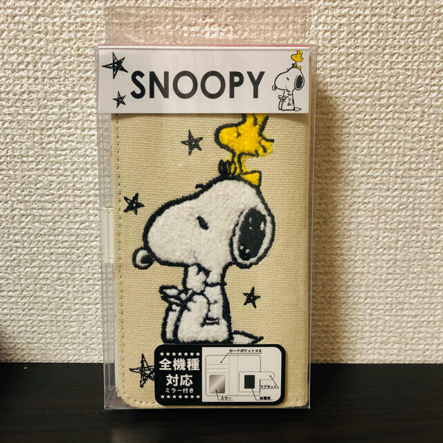 SNOOPY(スヌーピー)のスヌーピー手帳型スマホケース スマホ/家電/カメラのスマホアクセサリー(モバイルケース/カバー)の商品写真