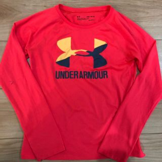 アンダーアーマー(UNDER ARMOUR)のアンダーアーマー　オレンジピンク　ロンT YMD(Tシャツ/カットソー)