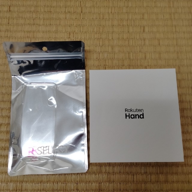 Rakuten(ラクテン)のRakuten　Hand　ホワイト　ケース付き スマホ/家電/カメラのスマートフォン/携帯電話(スマートフォン本体)の商品写真