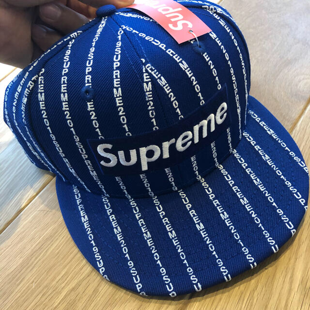 supreme text stripe new era royal 7 3/8