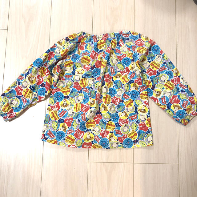 Disney(ディズニー)のトイストーリー　スモック　絵の具スモック キッズ/ベビー/マタニティのキッズ服男の子用(90cm~)(その他)の商品写真