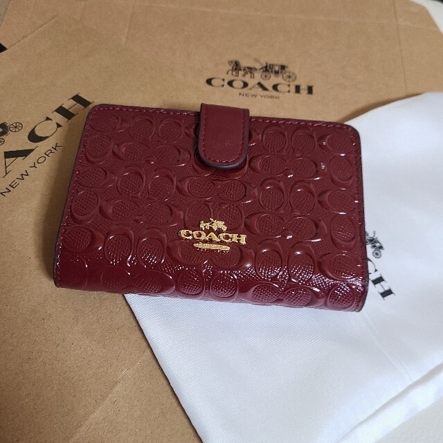 COACHの二つ折り財布