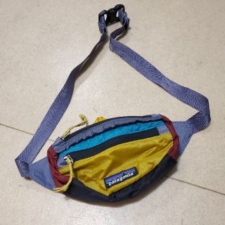 パタゴニア(patagonia)のPatagonia トラベルミニバッグ (マルチカラー)(ボディーバッグ)