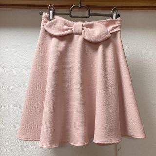 イング(INGNI)の【タグ付新品】INGNI★ピンクのリボン付フレアスカート(ひざ丈スカート)