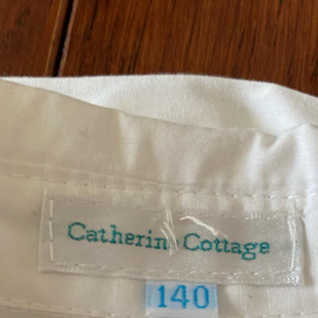 Catherine Cottage(キャサリンコテージ)のフリルの白いブラウス　140センチ キッズ/ベビー/マタニティのキッズ服女の子用(90cm~)(ブラウス)の商品写真