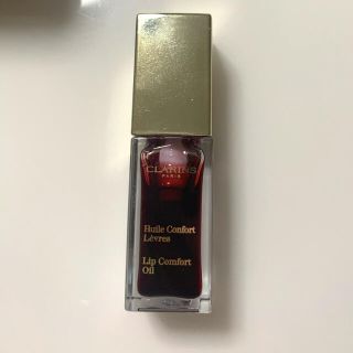 クラランス(CLARINS)のコンフォート リップオイル 03 レッドベリー(リップグロス)