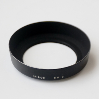 ニコン(Nikon)のNikon HN-2 ニコン 28mm用 メタルフード「刻印」タイプ(レンズ(単焦点))