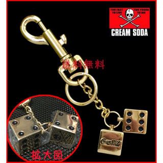 バウンティハンター(BOUNTY HUNTER)のCREAMSODAドクロメタルダイスキーホルダーGDサイコロ 金色ピンクドラゴン(キーホルダー)