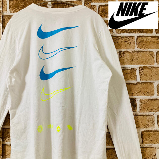 NIKE(ナイキ)の【美品】NIKE ナイキ　長袖　ロンt バックプリント　ロゴ多数　レディース レディースのトップス(Tシャツ(長袖/七分))の商品写真